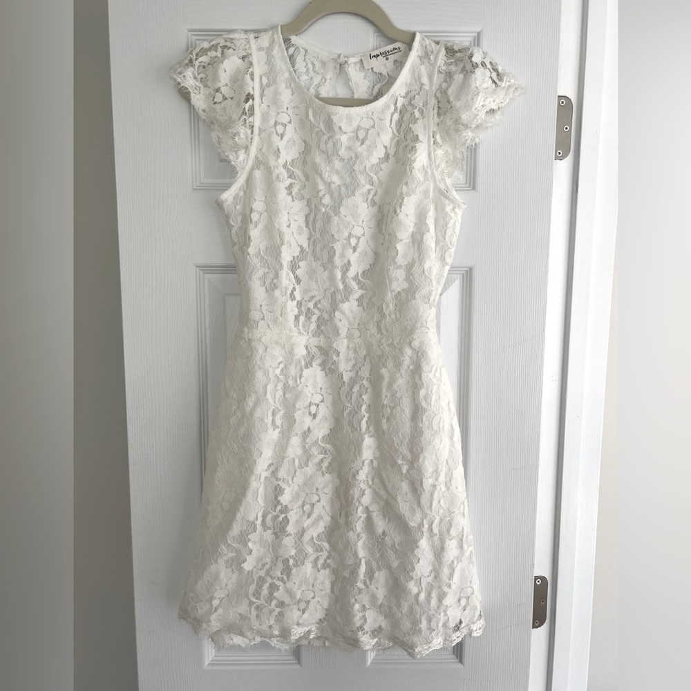White lace, open back cocktail dress